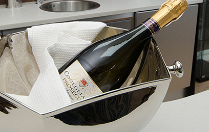 prosecco bottle in cooler tub